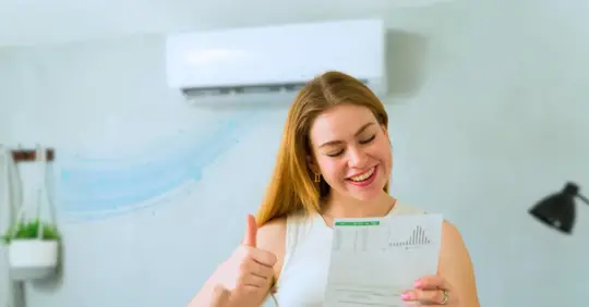 Woman happy with her energy bill